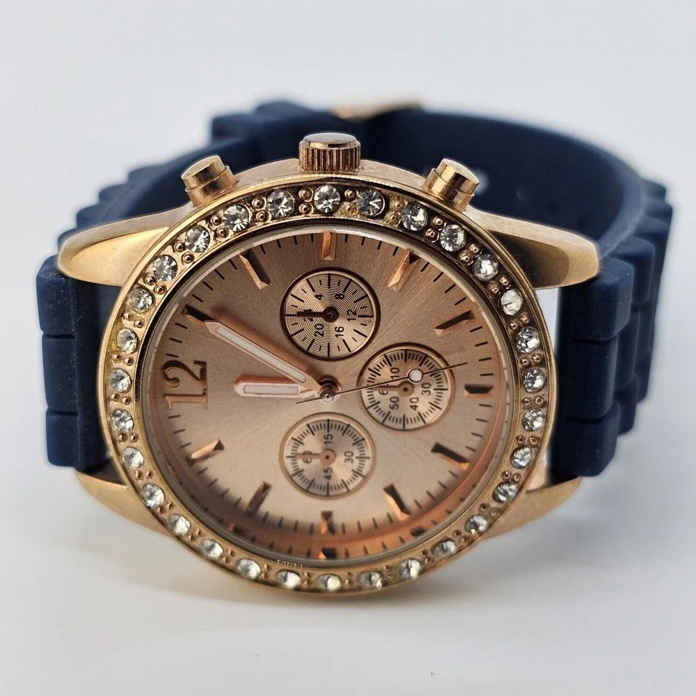 Women's Watch 38MM‎ Rose Gold Dial Crystal Bezel Blue Plastic Bands New Battery